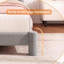 Structure de lit plateforme simple rembourrée en coton gris avec pieds de colonne arrondis, tête de lit rembourrée et support de lattes de matelas pour chambre dortoir