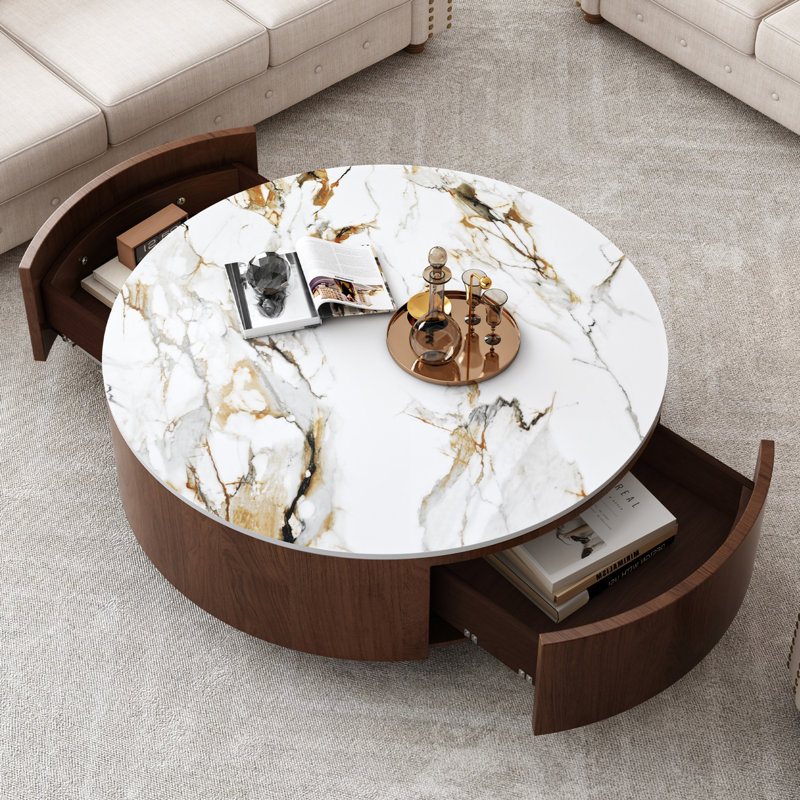 Table basse ronde avec 2 tiroirs à fermeture douce, plateau en pierre frittée imitation marbre et piètement en placage de noyer