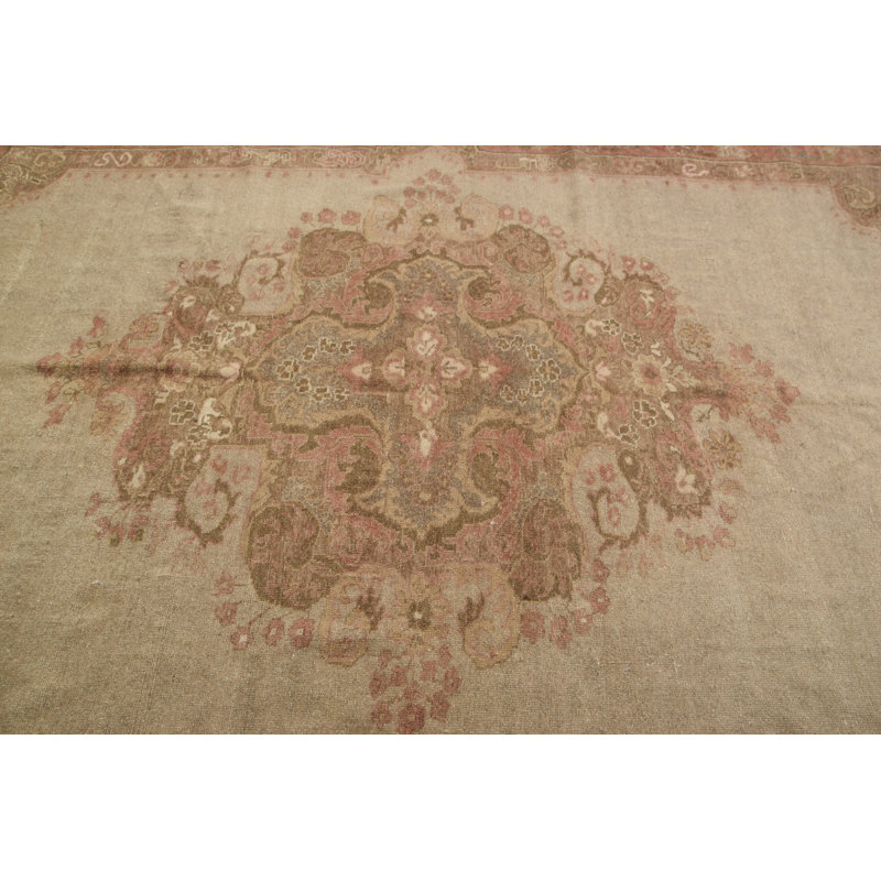 Tapis turc beige avec motif médaillon complexe pour une décoration intérieure élégante