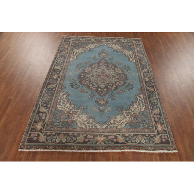 Tapis bleu clair fait à la main 7 x 9