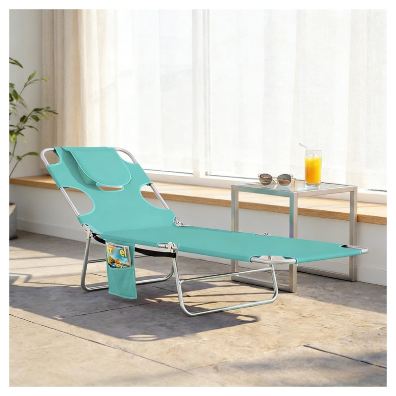 Chaise longue pliante d'extérieur vert clair avec dossier réglable et fonction de bronzage