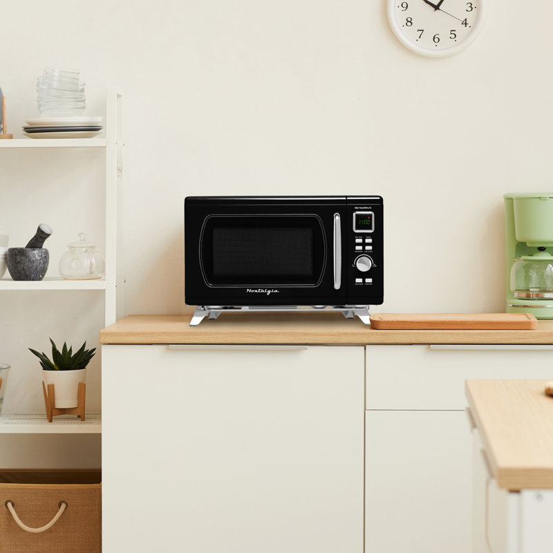 Nostalgia 0.9 Cubic Feet Countertop Microwave,  Black