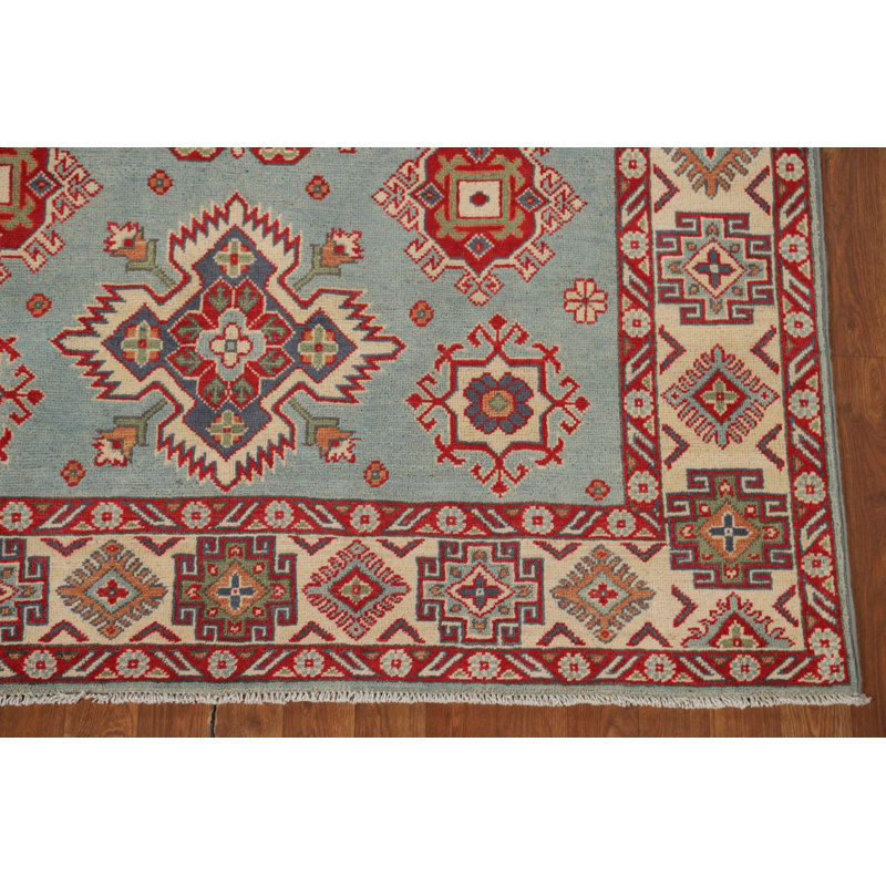 Tapis oriental bleu fait à la main Kazak