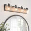 Luminaire de salle de bain à intensité variable Modern Farmhouse avec verre ensemencé et contre-plaque en placage de bois-179862212-176119489