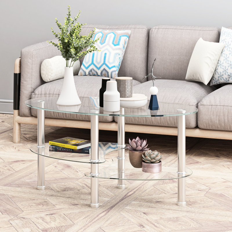 Table basse ovale moderne en verre transparent à 3 niveaux - Pieds en acier inoxydable, idéale pour la décoration du salon. Facile à nettoyer.