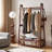 Solid Wood Garment Rack with Lockable Casters and Storage Basket - Walnut Finish