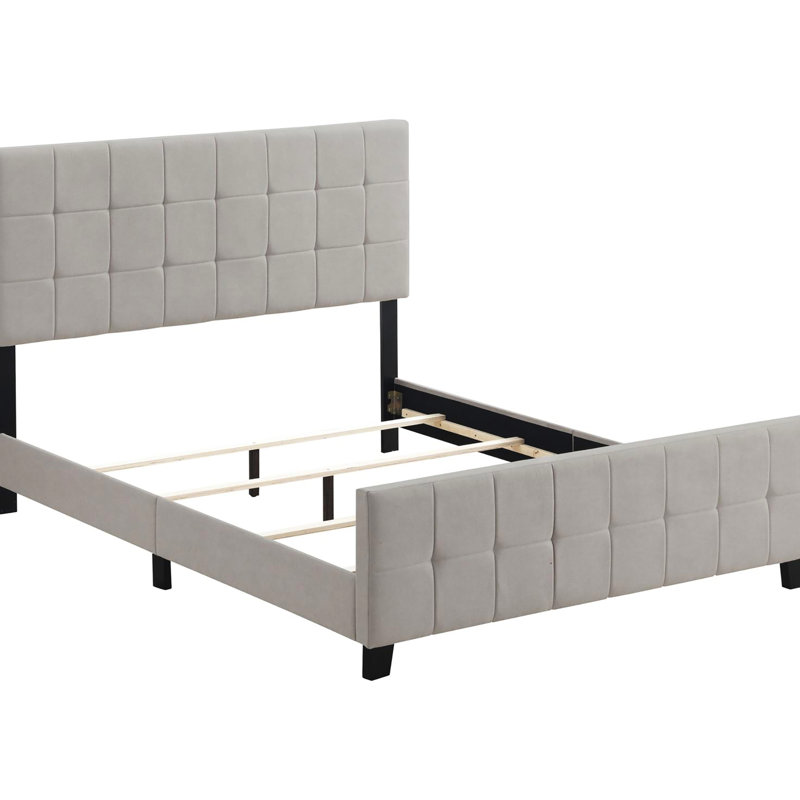 Grand lit contemporain beige, pieds brun foncé pour un design de panneau élégant avec revêtement