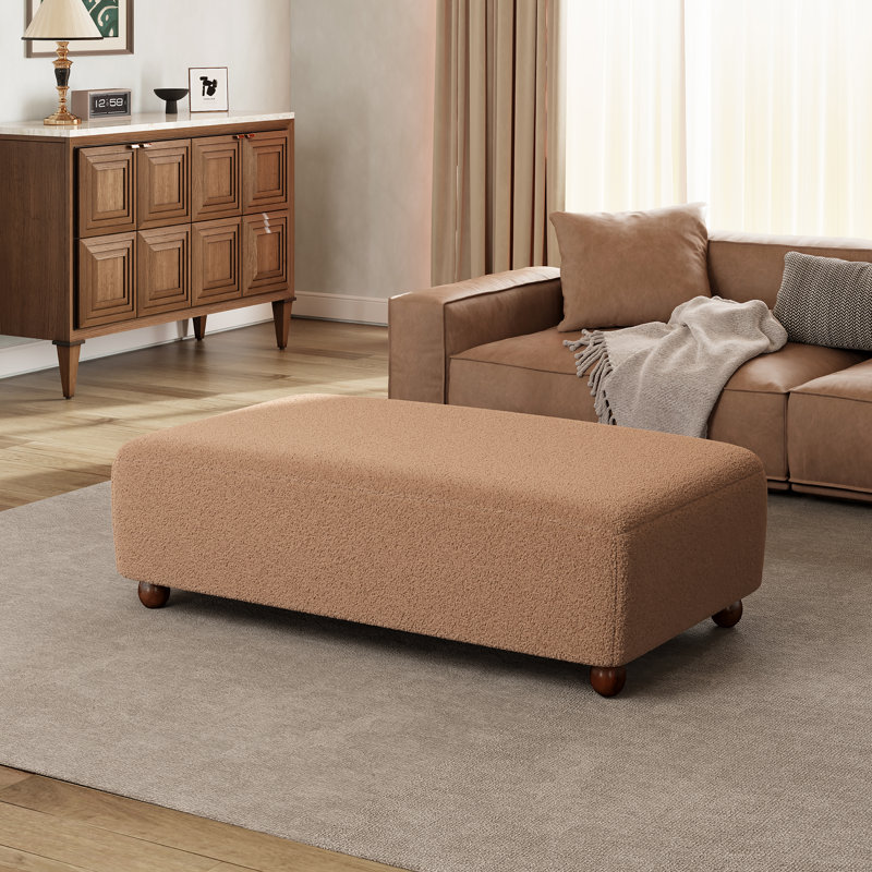 Banc de repose-pieds en tissu massif Callen, Chameau