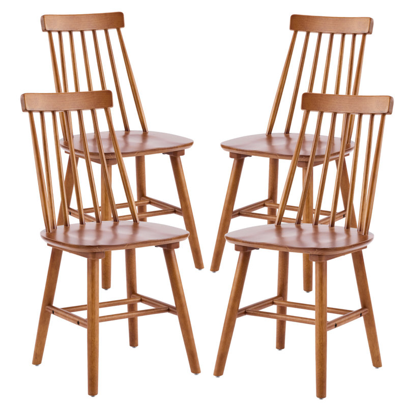 Ensemble de quatre chaises d'appoint à dossier Windsor en bois de noyer massif