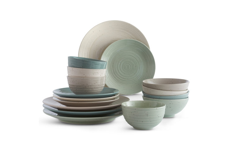 stoneware dinnerware set with gray, ivory, blue, and green dishes
