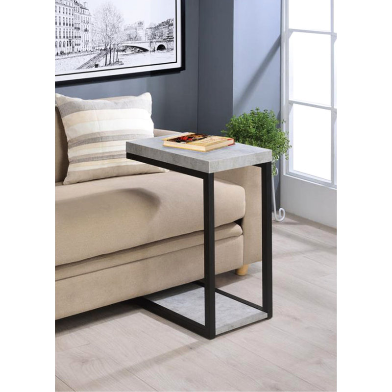 Table de collation moderne en ciment et noire, pratique et pratique pour les espaces de vie