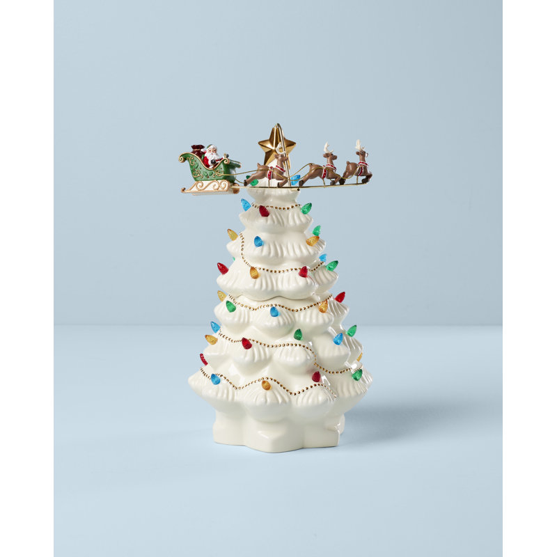 Arbre des Traditions précieuses avec père Noël volant