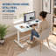 Bureau assis-debout électrique en verre Rise Up avec tiroir, ports USB et prises de courant-98618126