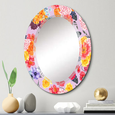 Miroir mural orange à motif de fleurs orange, jaune et bleu sur fond rose