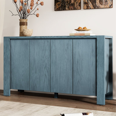 Buffet bleu marine avec tablettes réglables. Conception intemporelle à 4 portes. Et fabrication en bois d'hévéa. Protège les patins. 59 po L 15,9 po l 4 portes. Lignes épurées et fonctionnelles en bois. Planchers.