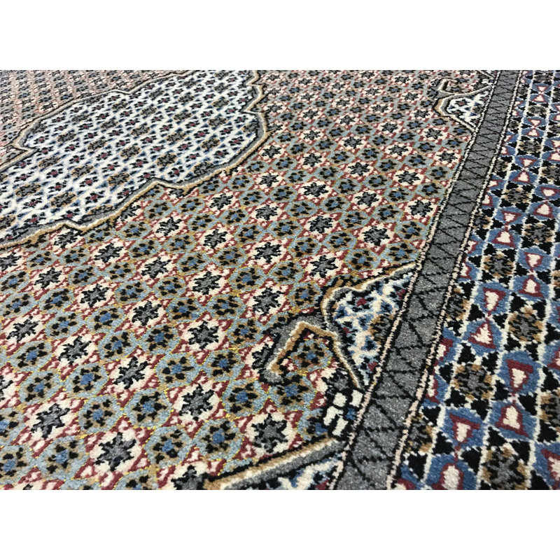 Tapis ivoire noué à la main de haute qualité