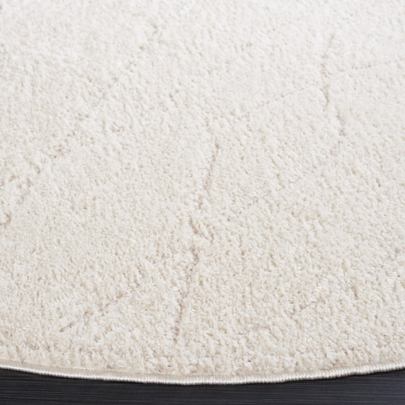 Tapis ivoire / beige en polyester tissé à la machine Bahiya, Rond 6 pi 7 po