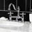 Kingston Brass Restoration Two-Handle 3-Hole Deck Mount Bridge Bathroom Faucet with Brass Pop-Up-11177302
