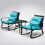 Ensemble de deux fauteuils à bascule d'extérieur en métal avec coussins et table basse pour la détente-232741625