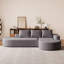 Élégant canapé arrondi en chenille haute résilience et assise très large pour une détente confortable