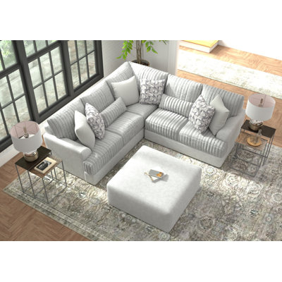 Titan - 2Pc Sectional With Comfort Coil Seating, 40" Cocktail Ottoman And 8 Accent Pillows Included