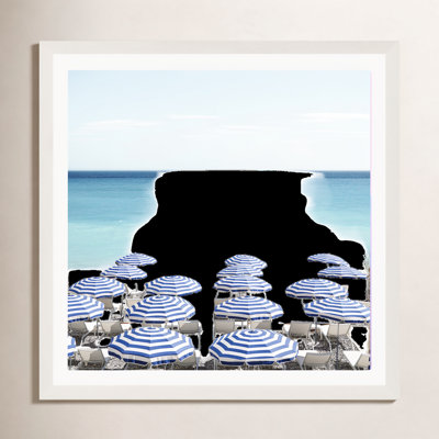 Blue Beach Umbrellas Photo by Henrike Schenk