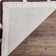 Tapis mauve / ivoire en laine Carolene