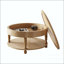Table basse ronde avec rangement dissimulé et tablette ouverte