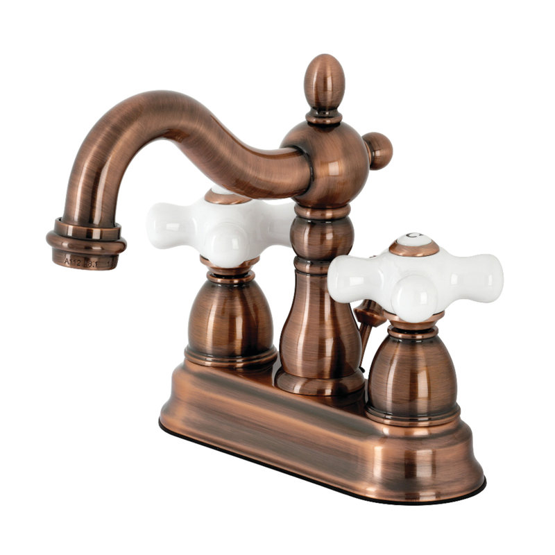 Kingston Brass Heritage Two-Handle 3-Hole Deck Mount 4" Centerset Bathroom Faucet with Plastic Pop-Up, Antique Copper