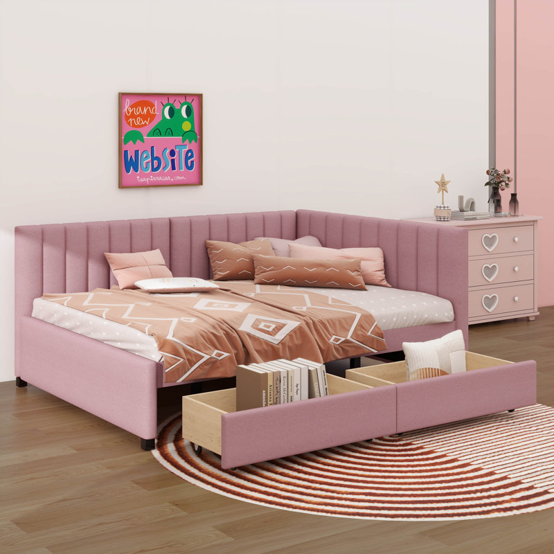 A Full-Sized Upholstered Daybed With Two Built-In Storage Drawers, Pink