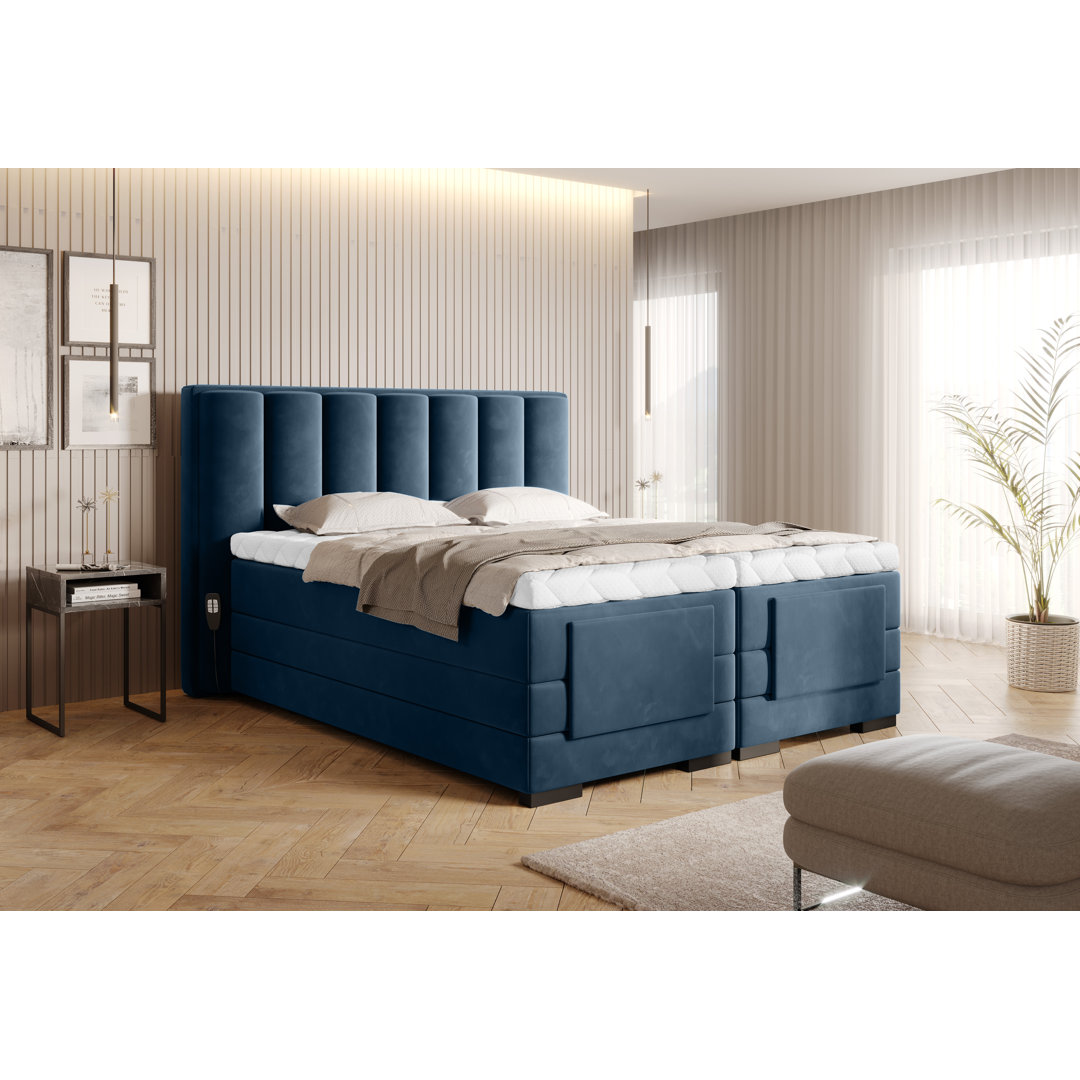 Elektrisch verstellbares Boxspringbett Ashli mit Topper