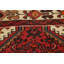 Tapis rouge à motif géométrique 3x5