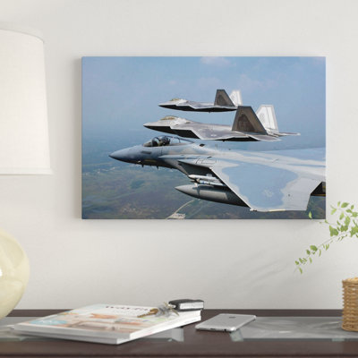 F-15 And F/A-22 Raptors Fly In Formation During A Training Sortie by Stocktrek Images - Gallery-Wrapped Canvas Giclée on Canvas