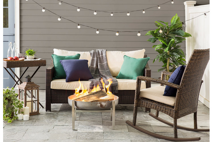 fire pit surrounded by chairs