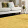 Natonia Shiny Shaggy Gold Area Rug