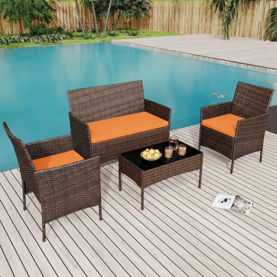 Ensemble de meubles de patio 4 pièces, canapé d'extérieur en rotin et table en verre, brun et orange