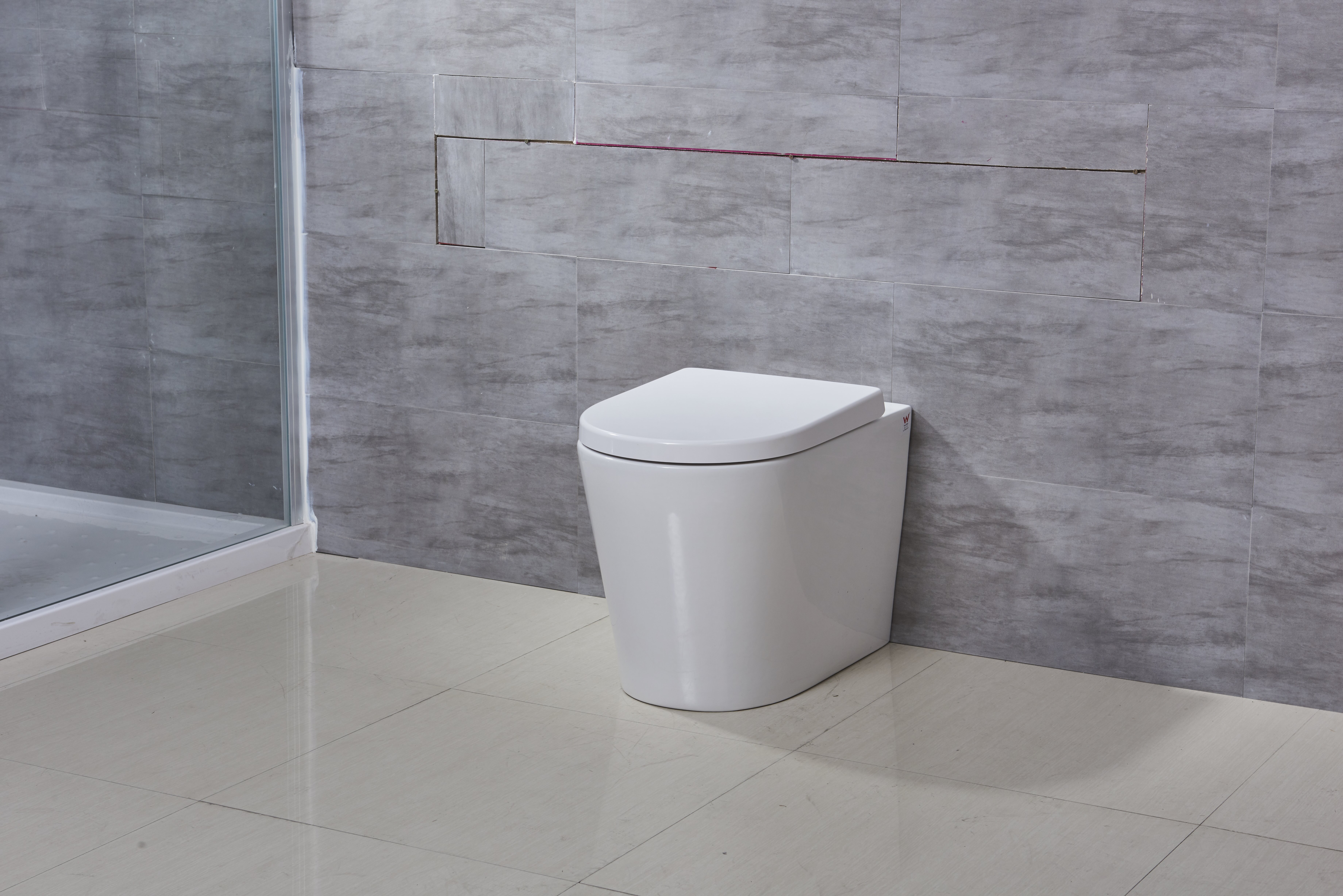 https://assets.wfcdn.com/im/93725885/compr-r85/8511/85119027/kdk-home-128-gpf-elongated-wall-mounted-wall-hung-toilets-seat-included.jpg