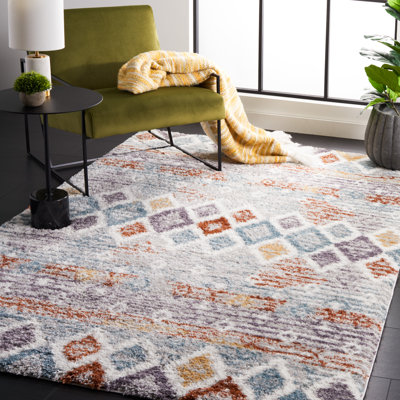 Evangelyn Geometric Blue Rust/Ivory Area Rug