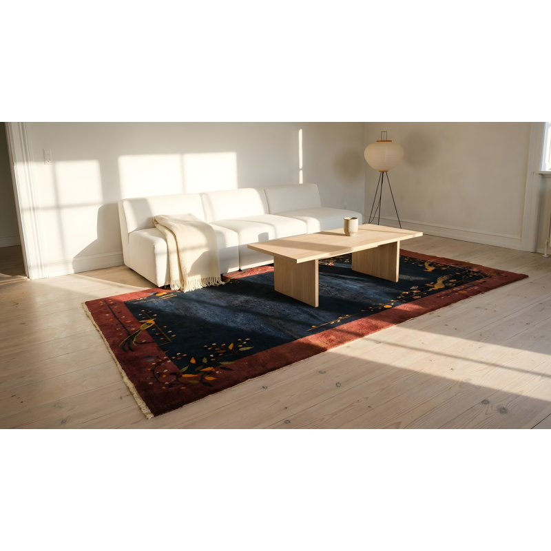 Tapis bleu antique en laine à motif oiseau minimaliste