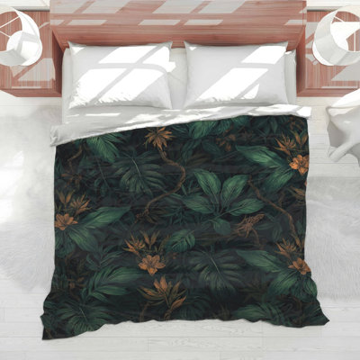 Édredon feuilles et fleurs tropicales