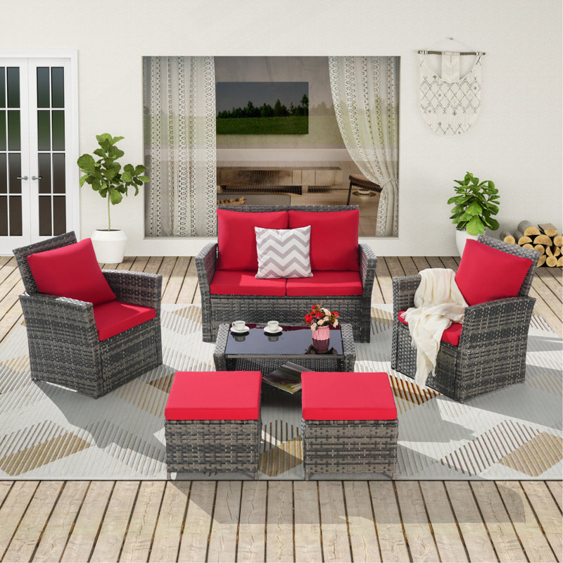 Ensemble de meubles de patio en osier 6 pièces avec repose-pieds et table basse en verre trempé, Rouge