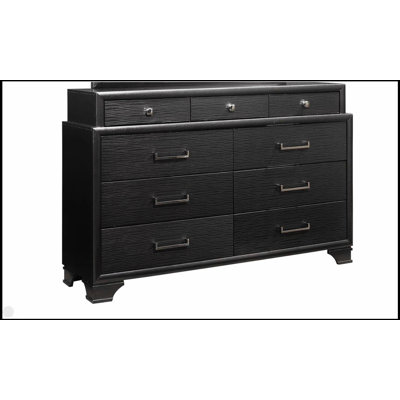 Commode gris civique avec neuf tiroirs spacieux et un plateau doublé de feutre, parfait pour le rangement et le style d'une chambre à coucher moderne.
