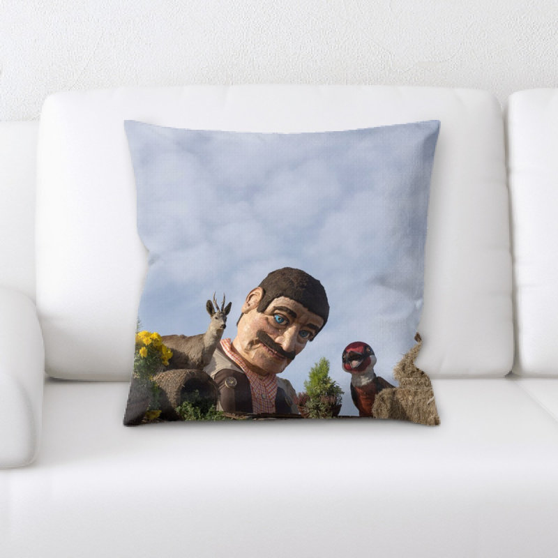 Coussin statue