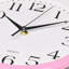Horloge murale Bernhard Products rose clair sans tic-tac