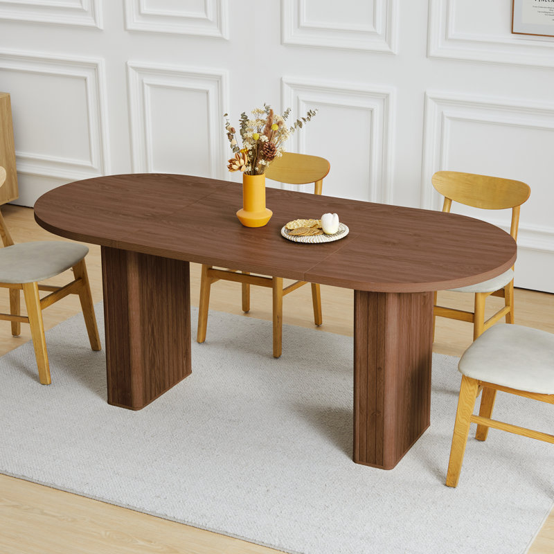 Dilakshan Oval 70.86'' L x 31.49'' W Dining Table, Walnut