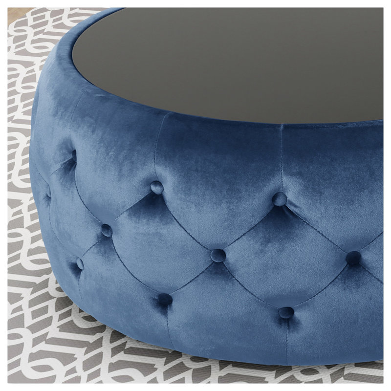 Repose-pieds rond en velours bleu foncé
