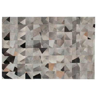 Faceta Cowhide Abstract Area Rug