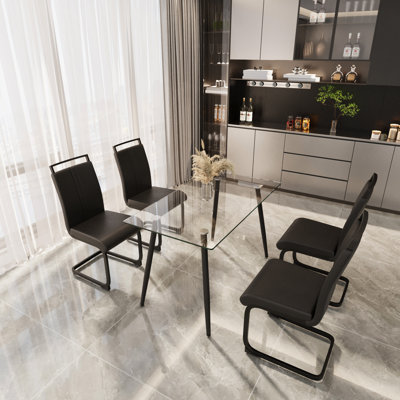 Table de salle à manger rectangulaire en verre trempé de 51 pouces avec pieds en métal noir et chaises ergonomiques en polyéthylène