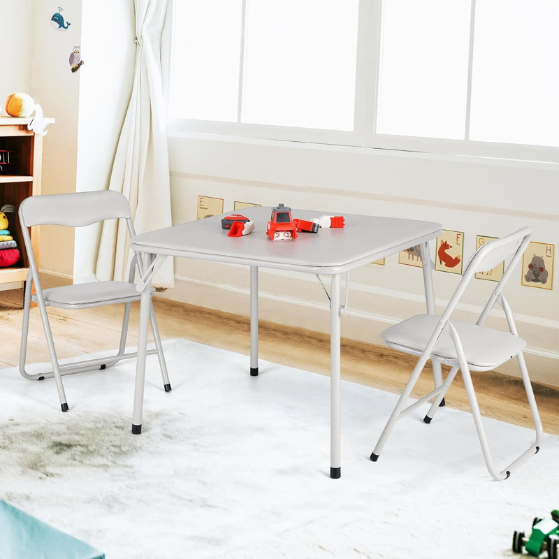 Table pliante en acier avec chaises rembourrées en cuir, coussins confortables, structure robuste, compact pour manger, étudier, jeux