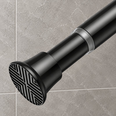 A black adjustable spring-loaded shower curtain tension rod spanning 32-76 inch; the no-drill, rust-resistant, non-slip design works in windows, doorways, kitchens, bathrooms, and closets.
